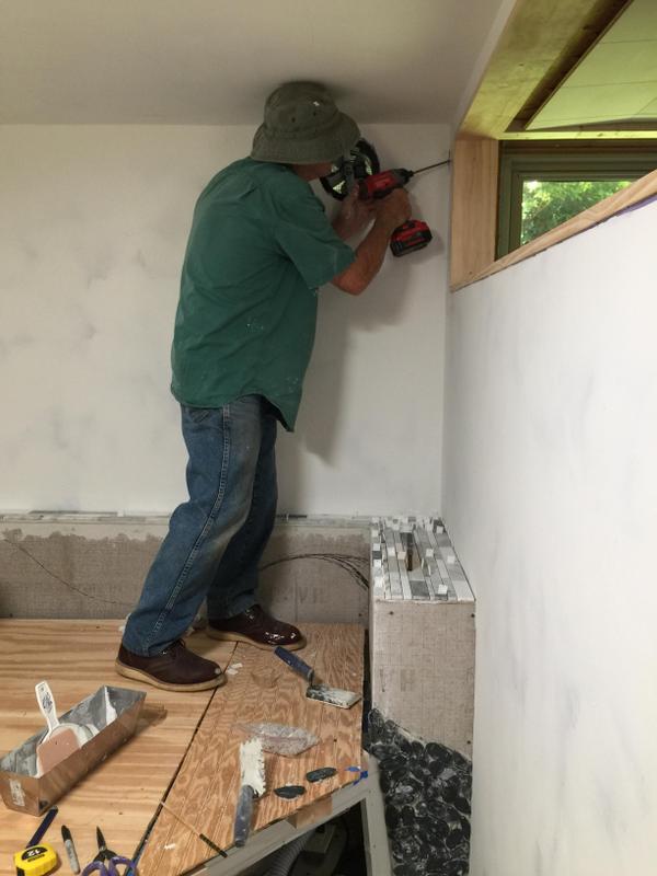 Dad working on the bathroom