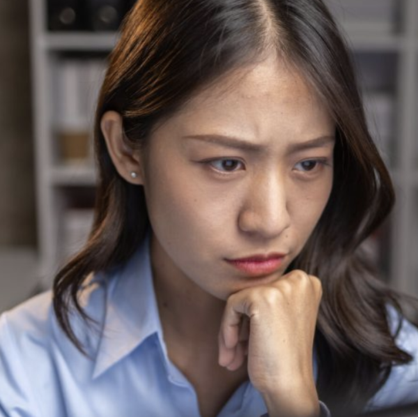 Female doctor reviewing documentation