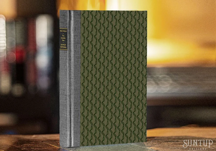 The Invisible Man from Suntup Editions: grey cloth spine with a black title label and olive-green boards printed with a wavy line pattern, standing upright