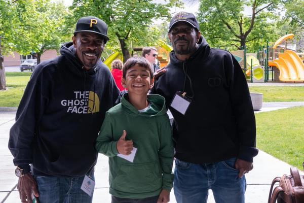 Twin Poets and youth teller celebrating - 2025 Summit & Festival - Photo credit Brother Valdez Photography