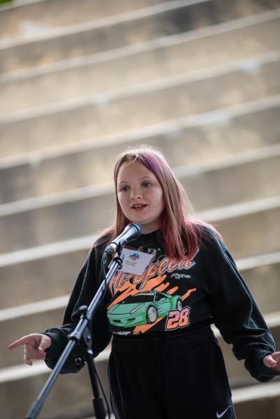 Youth teller performing at 2025 Summit & Festival