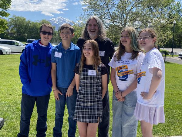 Peter Cook with youth tellers from 2024 Summit and Festival