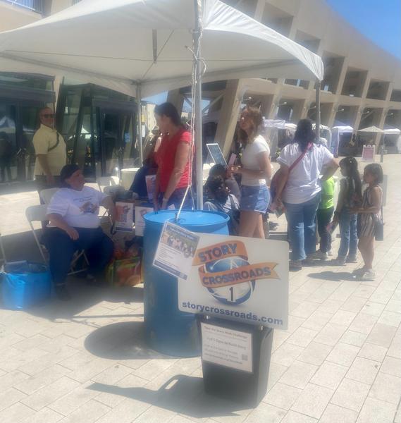 2024 booth at the Utah Arts Festival promoting the Story Walk