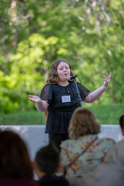 Youth teller at 2024 Summit & Festival - photo credit Bob Davis Photography