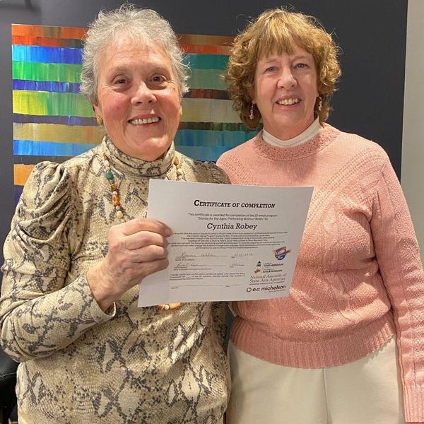 Cynthia Robey earning certificate from 10-week program guided by Laurie Allen