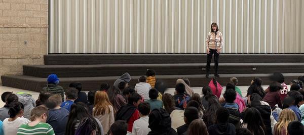 Cassie Ashton performing at kick-off assembly before workshops - Feb 11, 2026