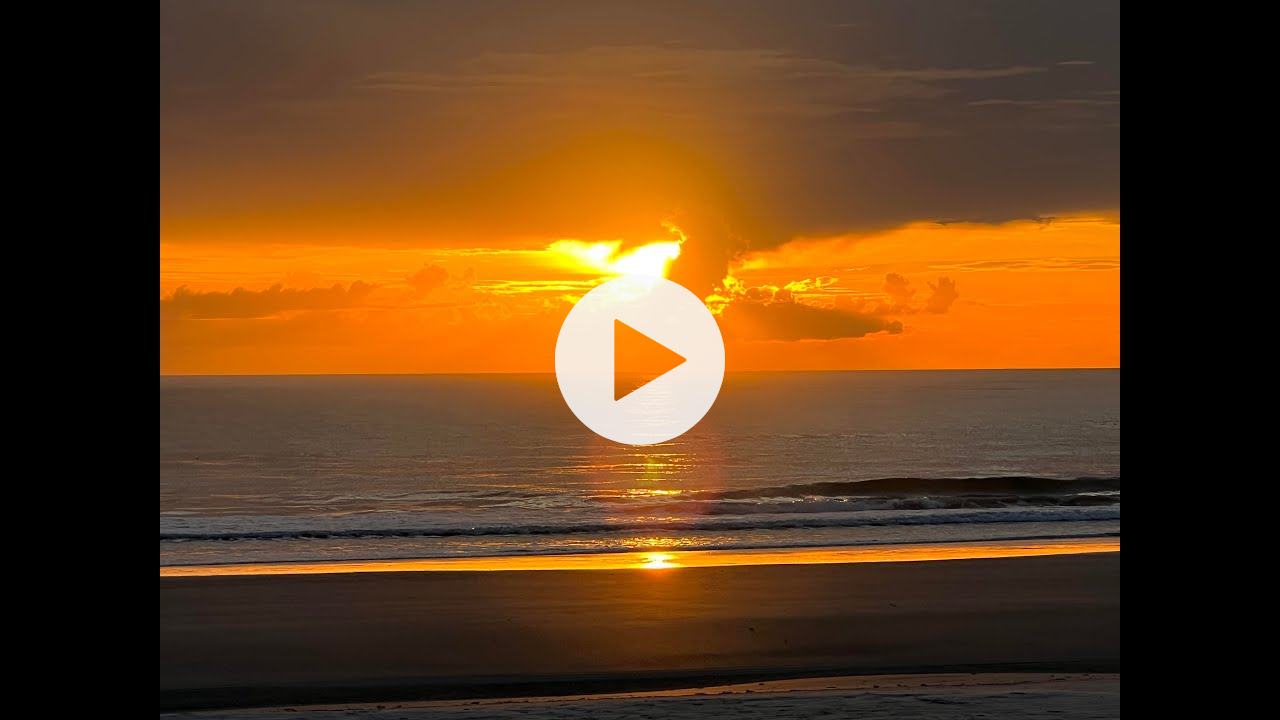 Glorious Sunset and Sunrise At New Smyrna Beach With Bright Colors Bursting Out