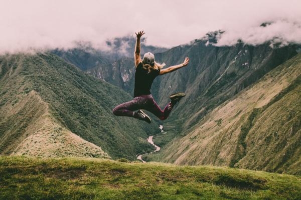 woman jumping in air