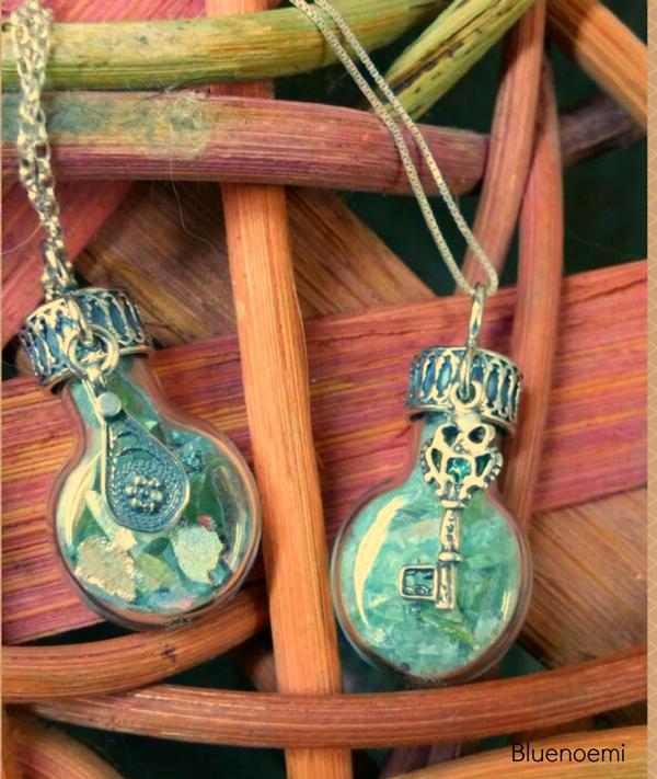 Click to the Roman Glass and Names Bottles necklaces