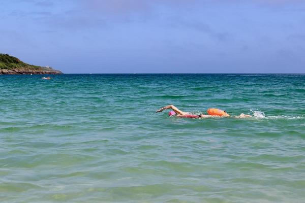 Group of swimmers on beach