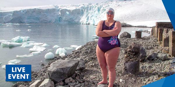 Swimmer standing next to icy and water