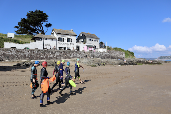 Group of swimmers on beach