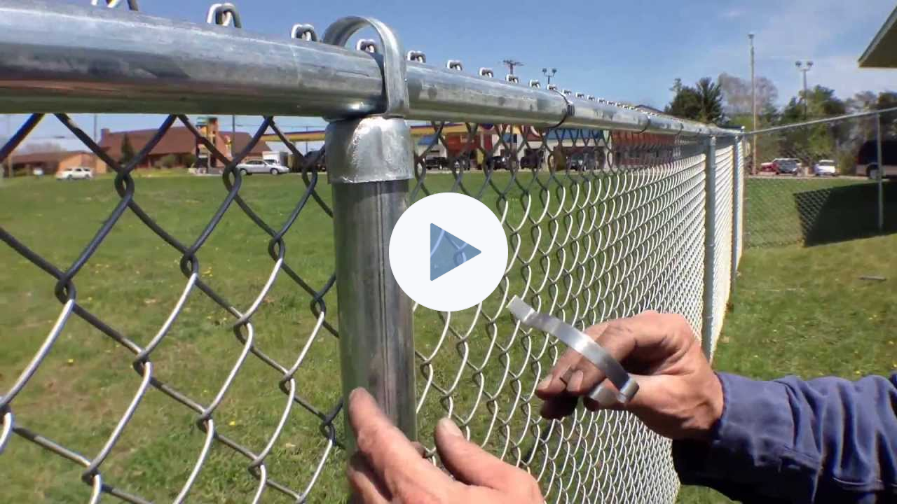 Self-Locking Fabric Bands offer a neat, professional look on residential chain link fence jobs