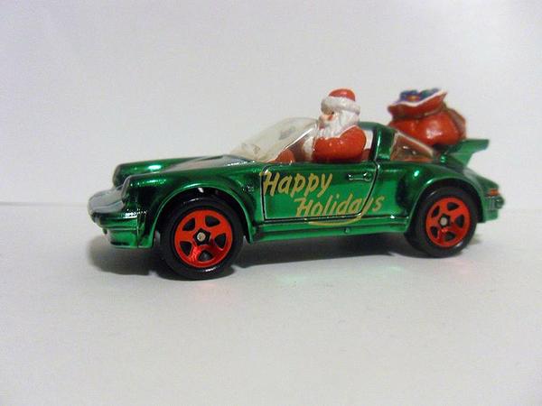 porsche wheel in front of christmas tree