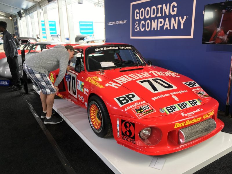 Adam Carolla checking out Paul Newman's Porsche 935 at the Gooding Auction