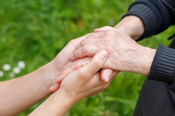 Young hands holding old hands