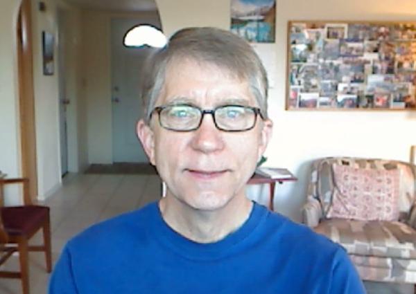 Screen shot of Nathan in home office space