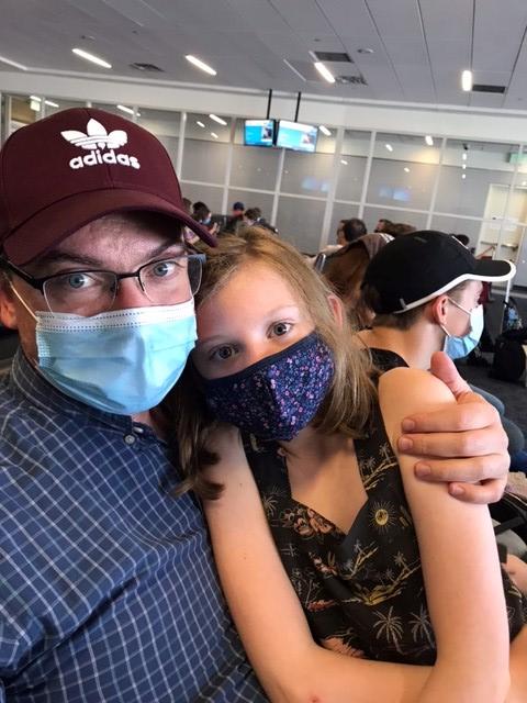 Ethan and a daughter in the airport