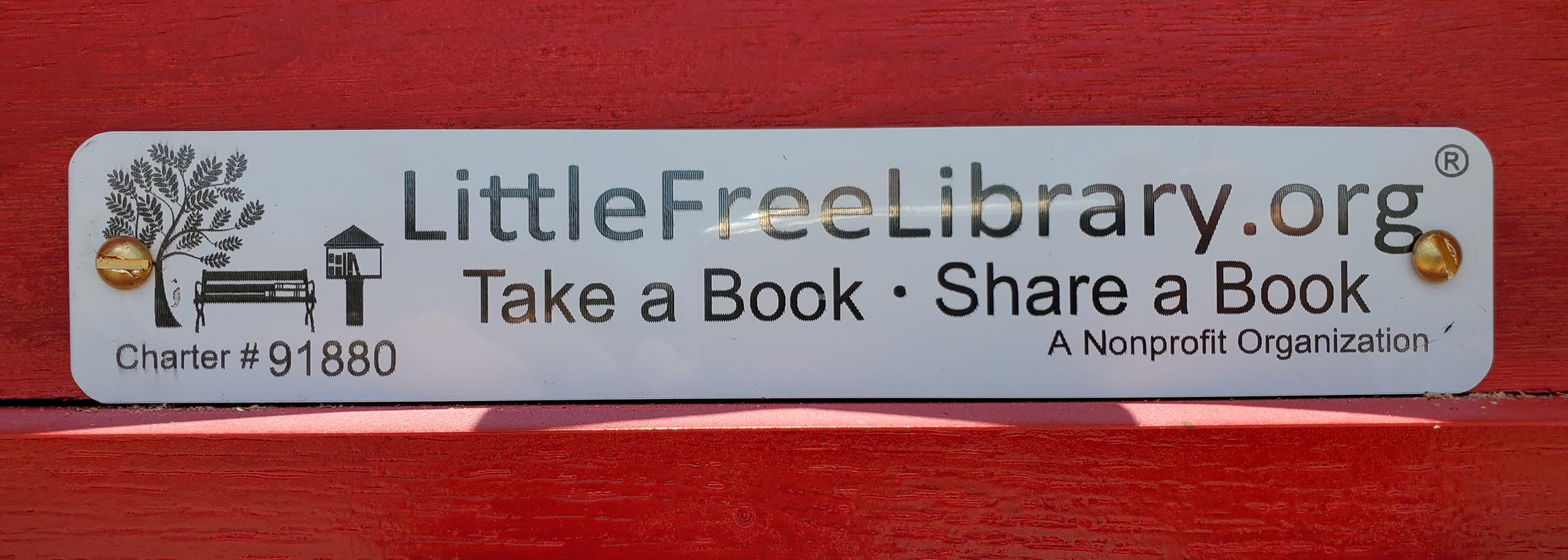 Little Free Library plaque at Sunrise Chapel