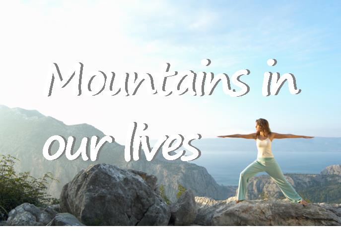 a woman doing yoga on a mountain