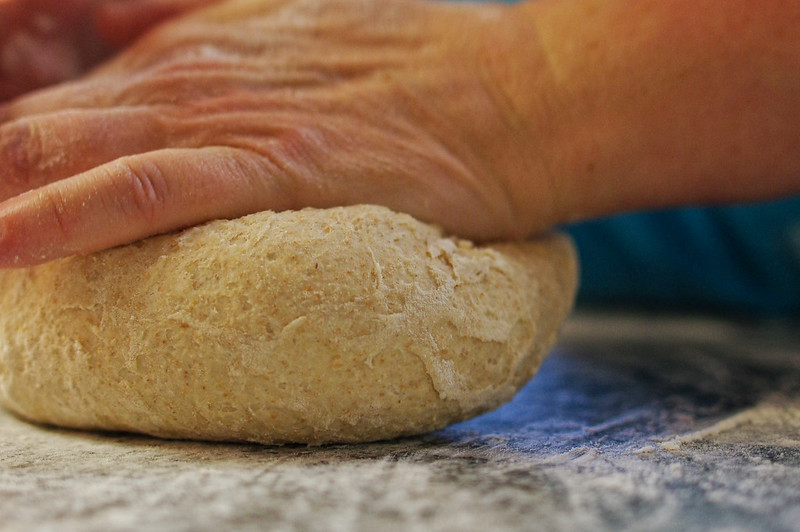 kneading bread dough