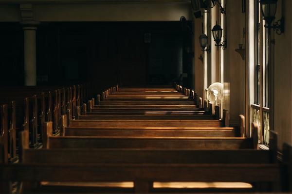 Photo by Nikko  Tan: https://www.pexels.com/photo/brown-wooden-church-bench-near-white-painted-wall-133699/