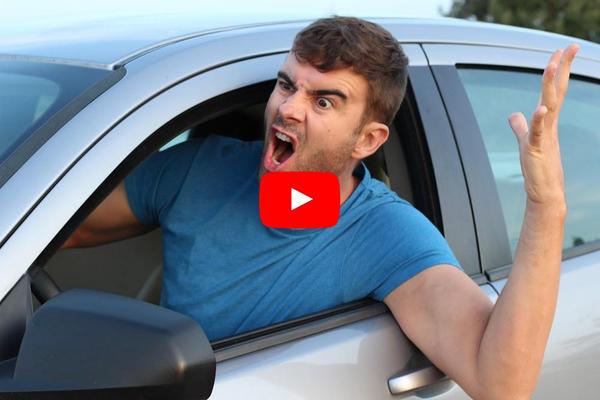 Man yelling in road rage.