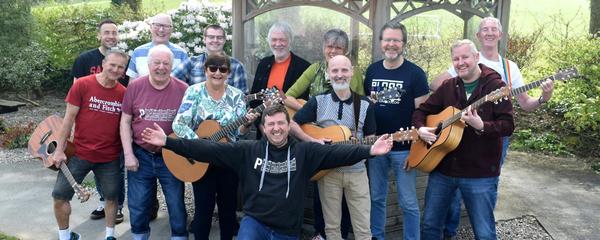 Drue and his students at the April 2022 Guitar Retreat in Devon.