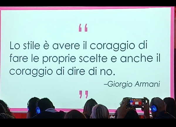 Giorgio Armani quote in Italian on presentation slide