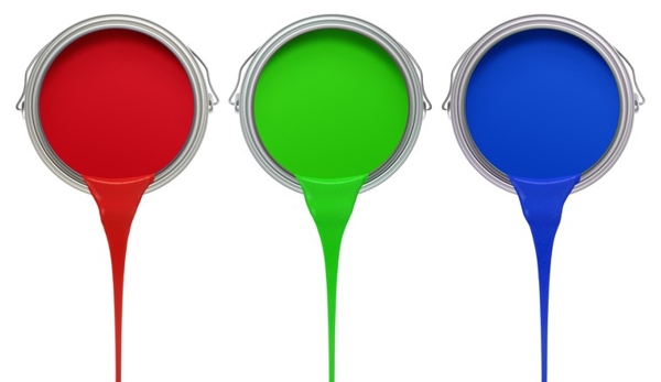 Red, green, blue paint pouring out of 3 paint cans