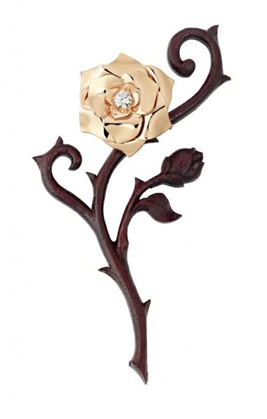 The Paiget rose brooch, a gold rose set with a diamond.