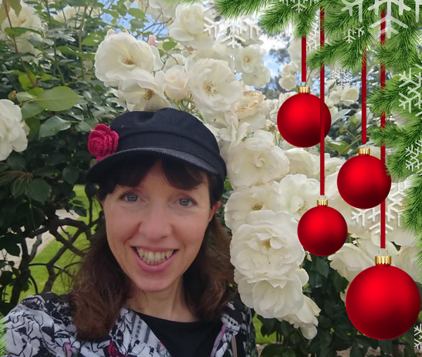 Picture of me with iceberg roses and red Christmas baubles