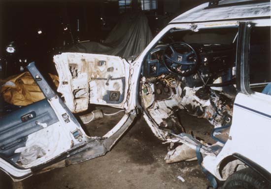 Judi's bombed car in Oakland Police Department storage, 1990. OPD photo
