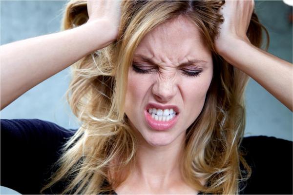 woman pulling her hair