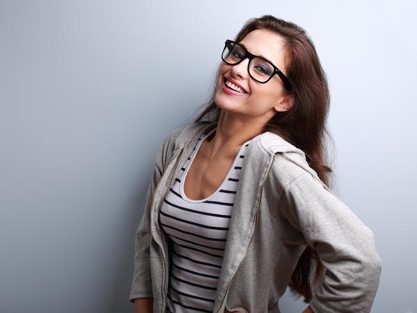 image of hopeful woman wearing a striped shirt