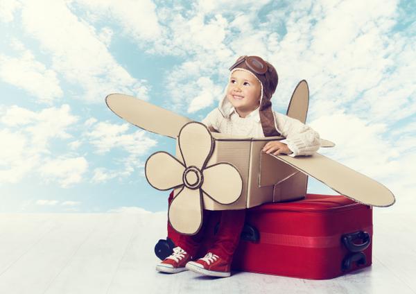 little girl dreaming of flying