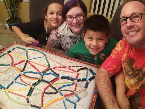 my family playing Ticket to Ride