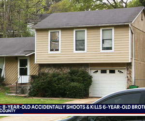 Boy Fatally Shoots Younger Brother w/ AR-15 Left on Floor; Father Charged w/ Murder