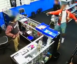 Watch Shootout Between Smoke Shop Employee and 4 Armed Robbers