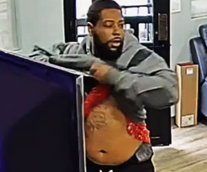 Suspect Pulls Gun on Car Dealership Employee, Smiles and Runs Off When Employee Pulls Gun on Him