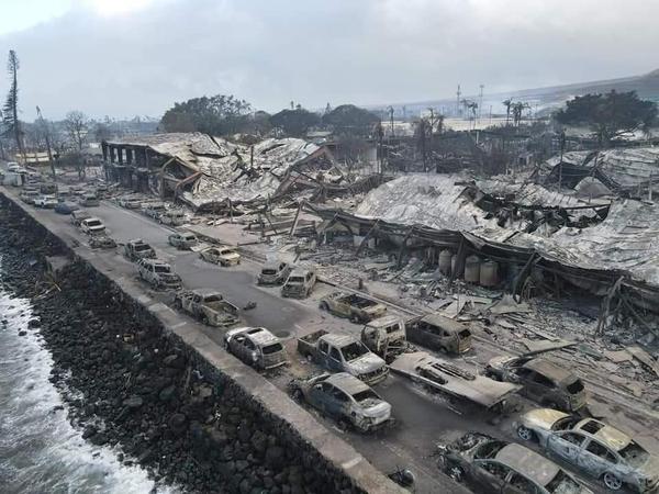 Cars abandoned and buildings collapsed on Front Street in Lahaina Maui