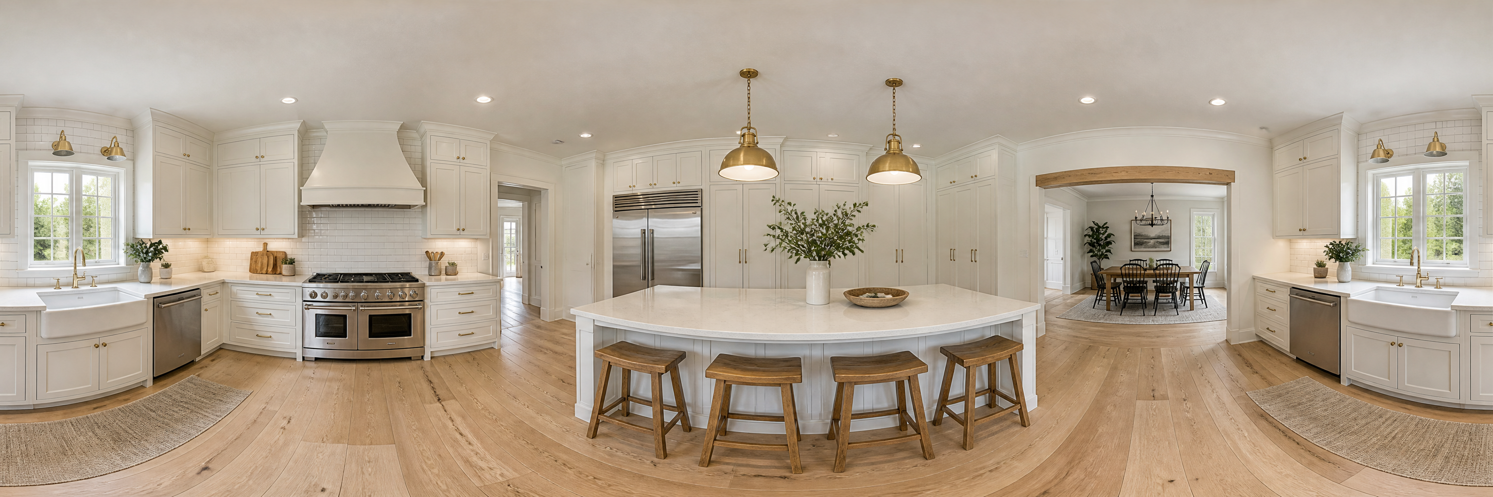 360 degree view of a white shaker kitchen with a quartz island, wooden stools and brass pendant lights