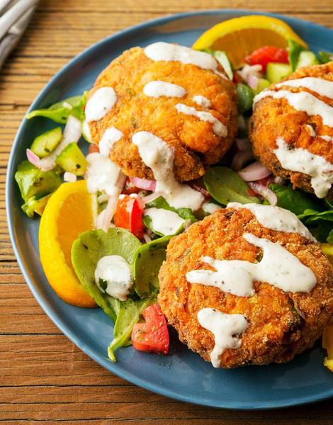 Salmon patties on a plate. 