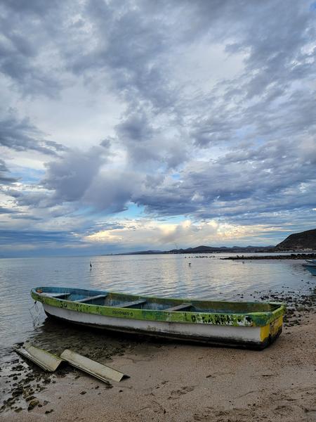 A weathered panga on the beach in La Paz, Mexico. 