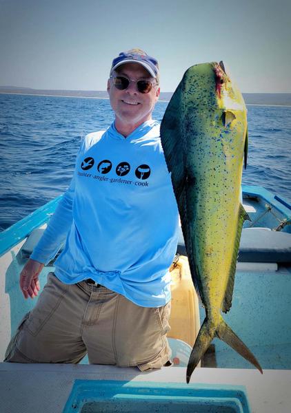 Hank Shaw holding a dorado. 