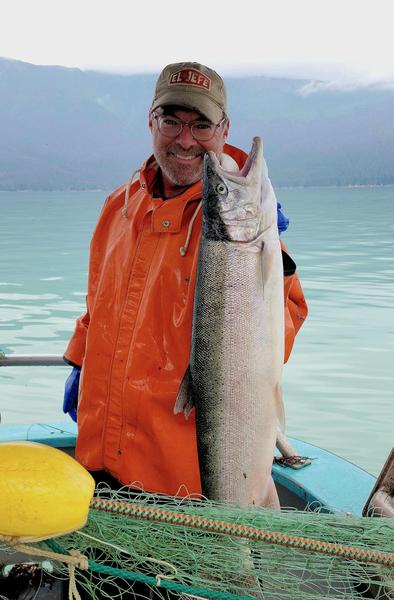 Hank Shaw holding a steelhead.