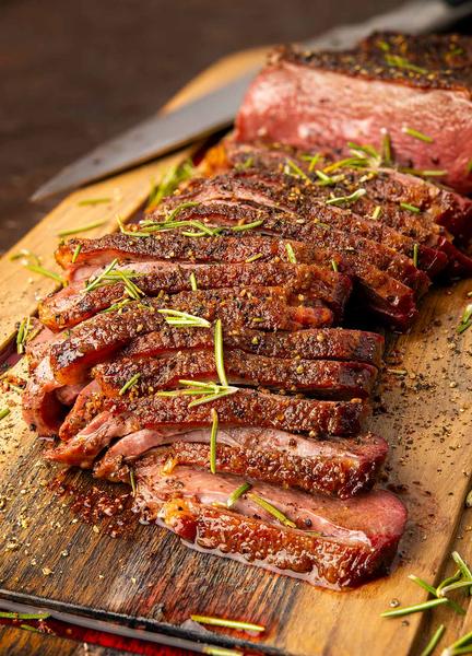 Sliced goose breast on a platter. 