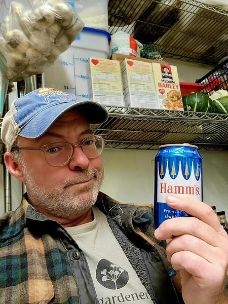 Hank Shaw enjoying a Hamm's beer after diunner service. 
