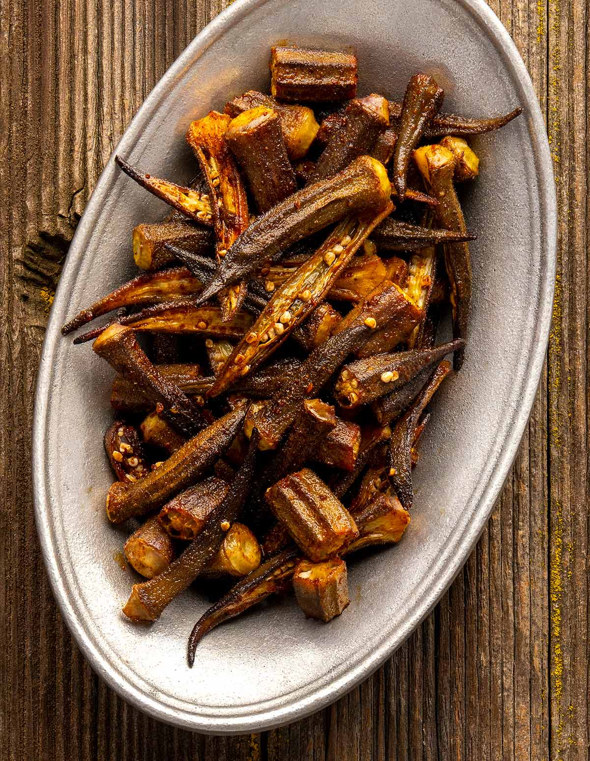 Roasted okra on a platter, ready to eat. 