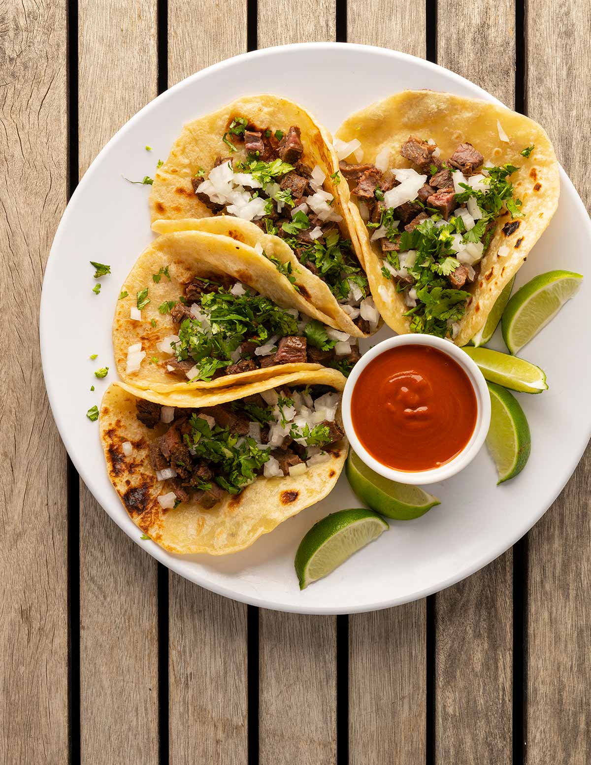 Arrachera tacos on a plate.
